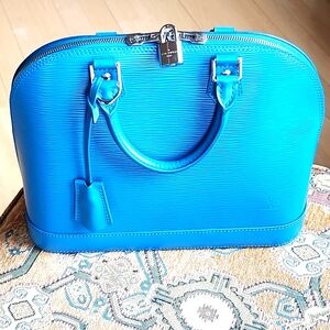 LOUIS VUITTON EPI ALMA PM